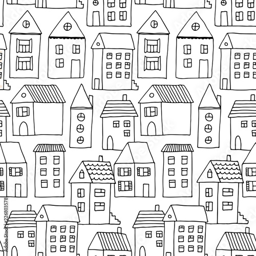 Hand drawn seamless pattern with doodle houses, vector background with cartoon town
