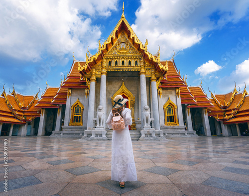 Photography Women tourists at Wat Benchamabophit or the Marble Temple in Bangkok, Thailand