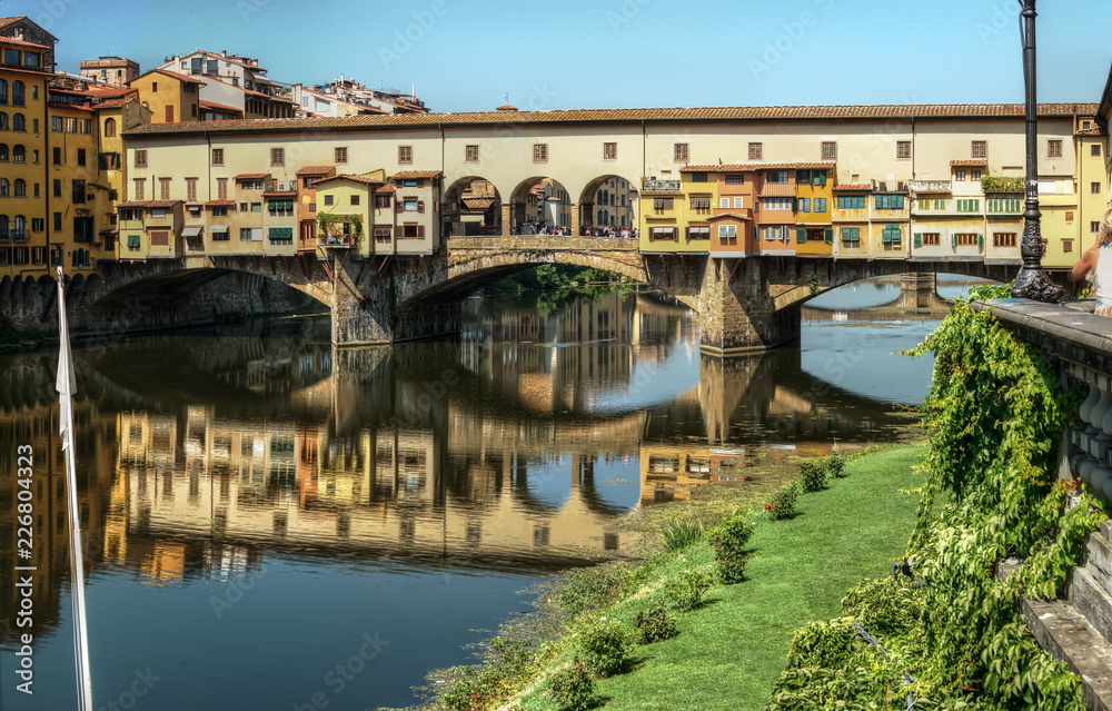 Ponte vecchio; famous covered bridge across the river Arno in Florence, Tuscany