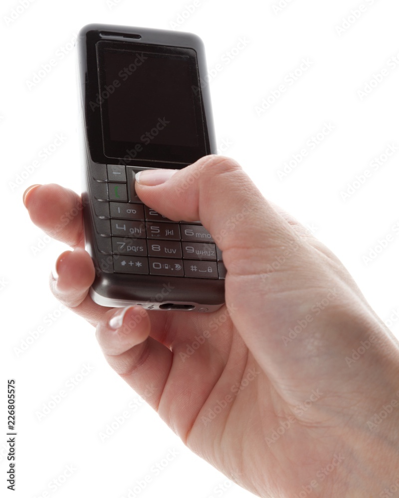 Closeup of Hand Using an Old Mobile Phone Closeup of Hand Using an Old Mobile Phone