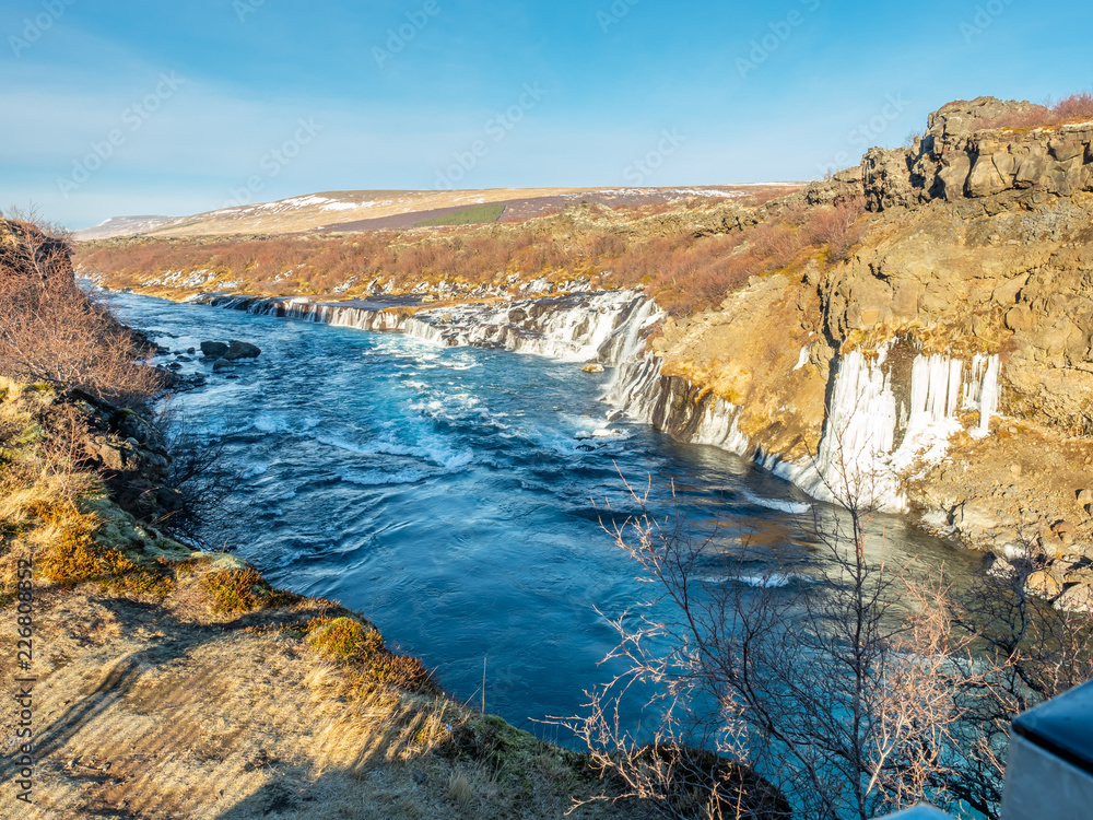 Hraunfossar waterfall in Iceland Hraunfossar waterfall in Iceland