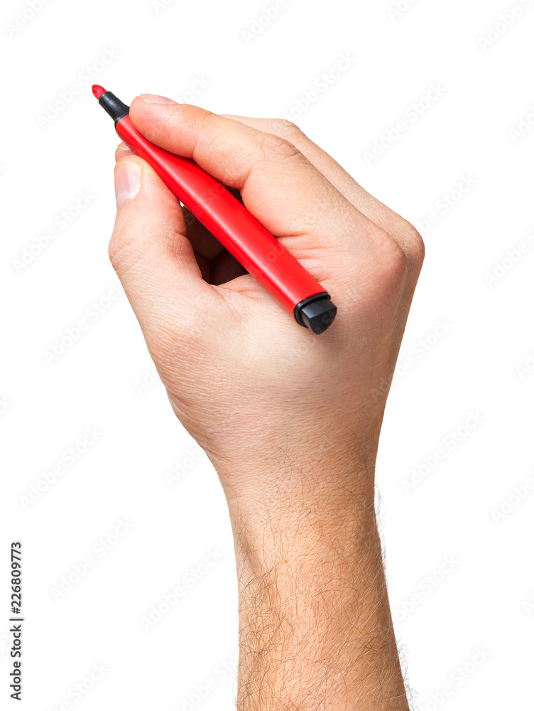Fototapeta premium Male hand holding red marker, isolated on white background.