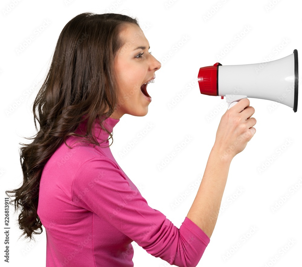 Brunette female yelling into a megaphone
