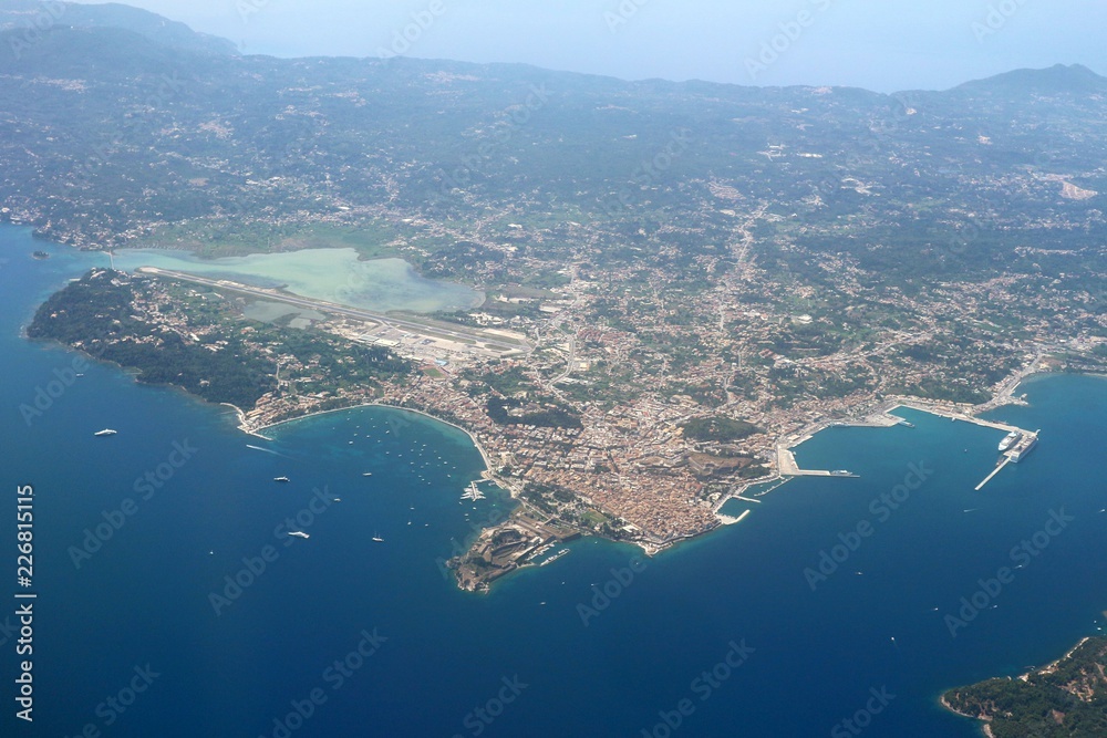 Corfu, greece – July 6, 2018: Corfu from the plan view Corfu, greece – July 6, 2018: Corfu from the plan view
