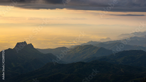 Morning sunshine with foggy mountains. View of beautiful mountaints. © Satawat