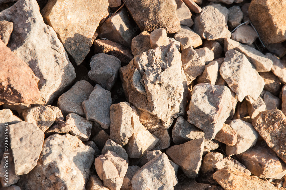 big pile of rocks and boulders piled with beautiful sunset light, big pile of rocks and boulders piled with beautiful sunset light,