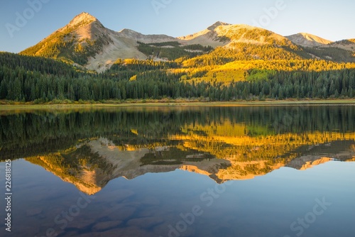 Early morning light in autumn on a Colorado lake