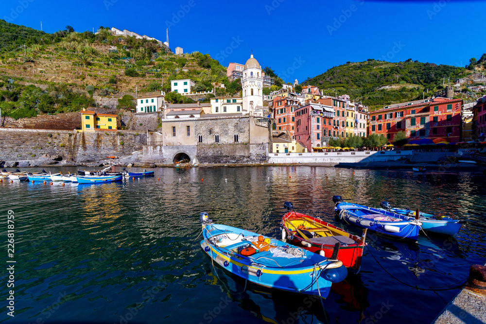 Colorful boats in Vernazza village Italy 