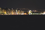 Beach in the evening of Thessaloniki, Greece.Night lanterns. The light of the night city.