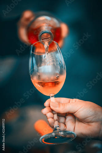 Rose Wine Glass and Bottle Close Up 