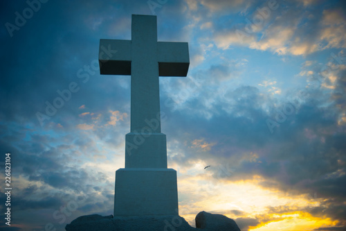 Christian cross in the blue sky