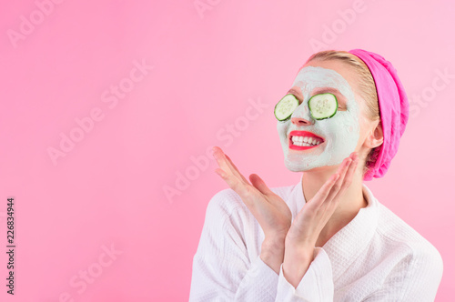 Happy woman with mask on fa...