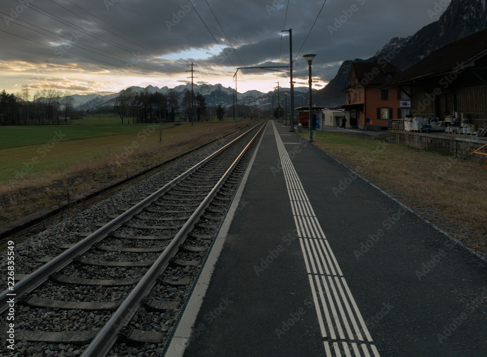 Naklejka premium Evening on platform at Rüthi SG, Swiss Rhine valley