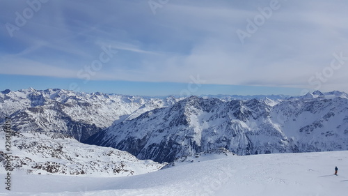 Image of ski resort in the winter with snow covered mountains and slops © Alex