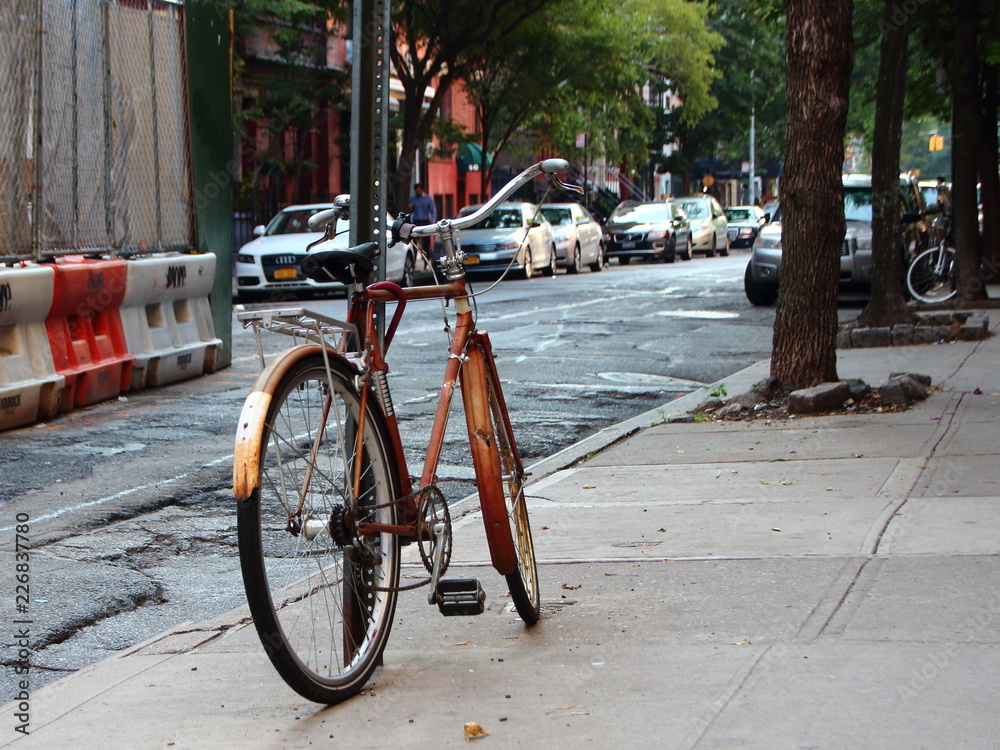 Bike Locked and Parked Leaning on Pole Bike Locked and Parked Leaning on Pole