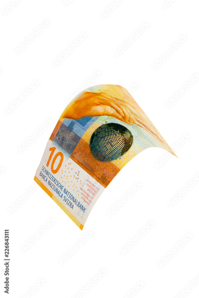 Flying Swiss money - 10 francs note isolated with clipping path