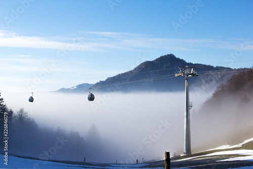 Cable Car in the foggy winter morning over the Alps Weissenstein mountain,  Solothurn, Switzerland