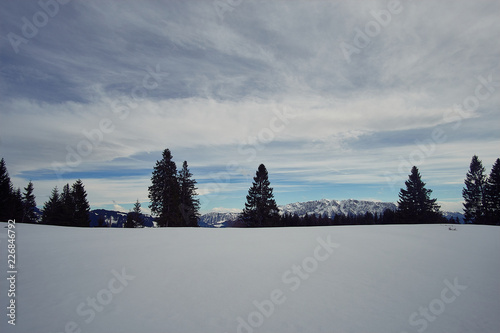 Winter snow covered mountain peaks in Europe. Great place for winter sports photo