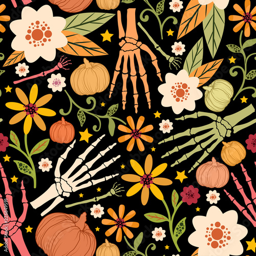 Halloween floral seamless pattern with bones,pumpkins,flowers and stars.Holiday vector background.Textile texture