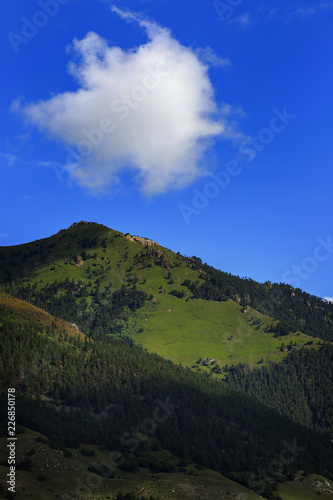 Clouds over the tops of the rocky mountains. Photographed in the Caucasus  Russia.