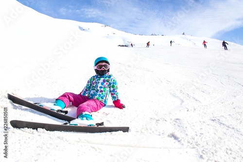 little girl in ski resort
