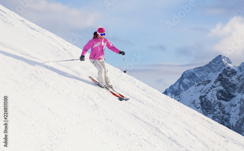 woman skiing  in the mountains