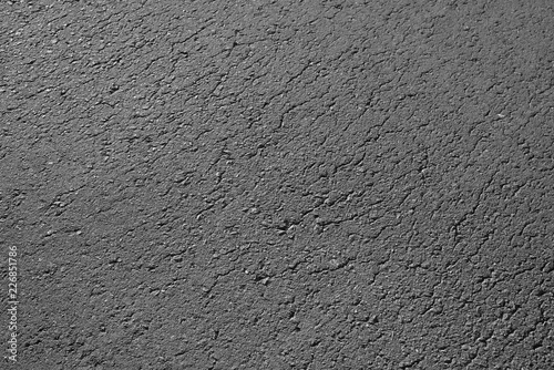 Asphalt background texture. New fresh asphalt black and white