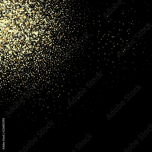Abstract falling golden lights. Magic gold dust and glare. Festive Christmas background.