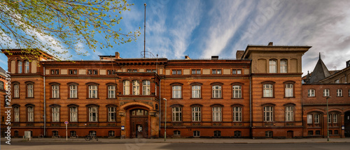 Denkmalgeschütztes Verwaltungsgebäude des 1828 gegründeten chirurgischen Universitätsklinikums in der Berliner Ziegelstraße - Panorama aus 4 Einzelbildern photo