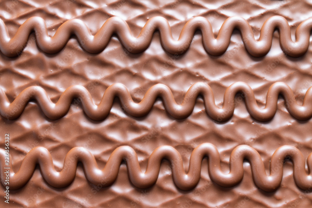 Naklejka premium chocolate background with abstract pattern