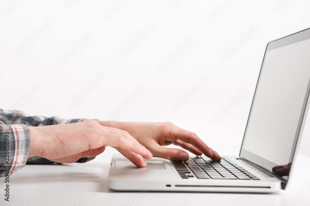 Laptop with man hand isolated on white background Laptop with man hand isolated on white background