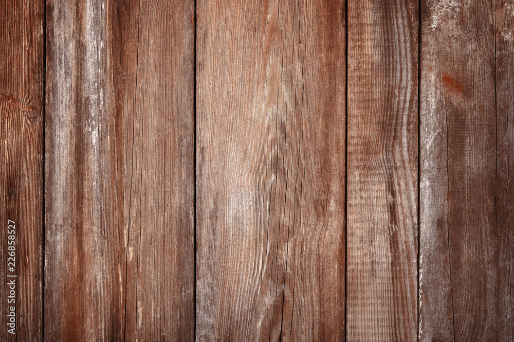 brown wood background. Old boards. Shabby wooden background. brown wood background. Old boards. Shabby wooden background.