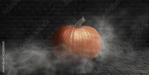 Halloween pumpkin on a dark background with smoke and fog at night photo