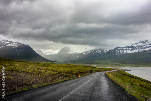 Dangerous winding downhill road in Iceland with a motion blur effect