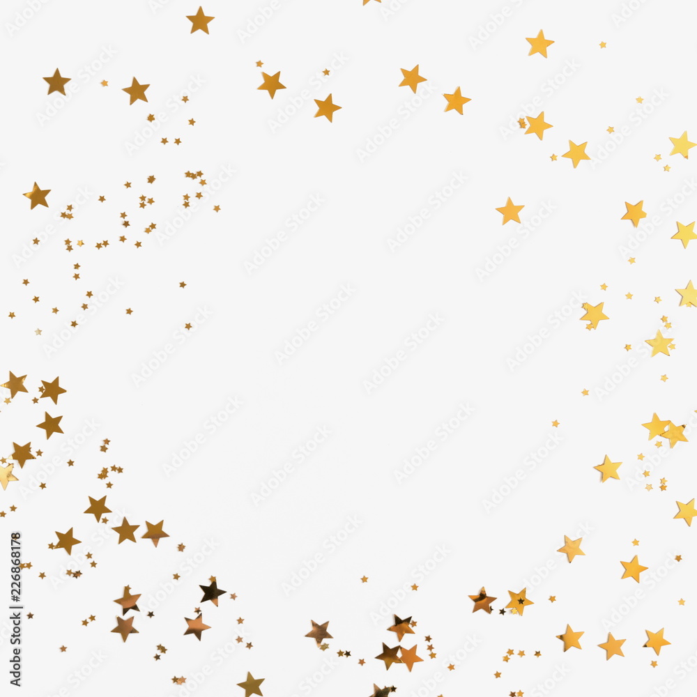 Festive background. Shining stars on white background. Christmas. Wedding. Birthday. Happy woman's day. Mothers Day. Valentine's Day. Flat lay, top view, copy space. 