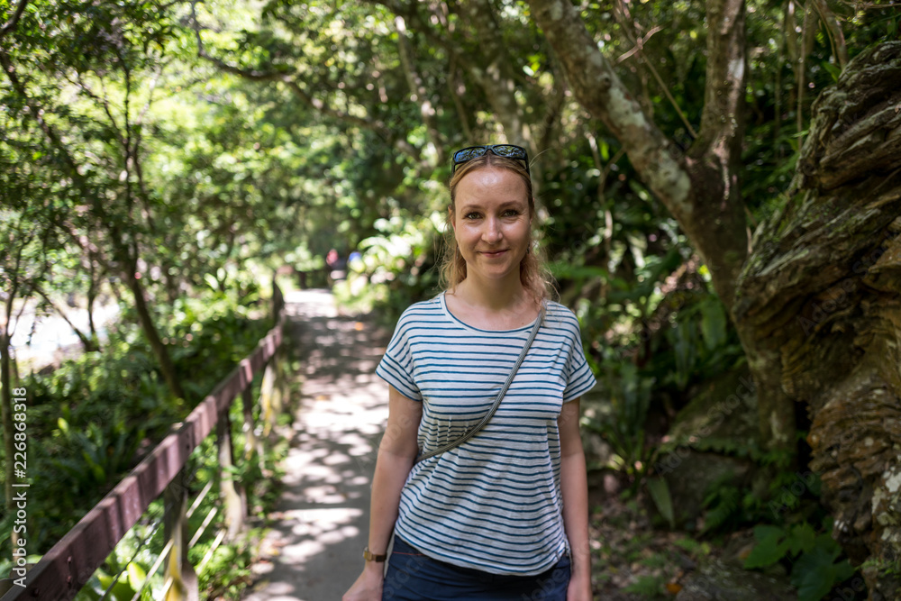 Caucasian girl at the Shakadang Trail at Taroko Gorge National Park in Taiwan Caucasian girl at the Shakadang Trail at Taroko Gorge National Park in Taiwan