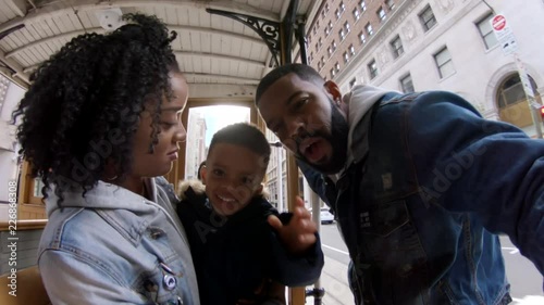 Family rides on San Francisco trolley, POV