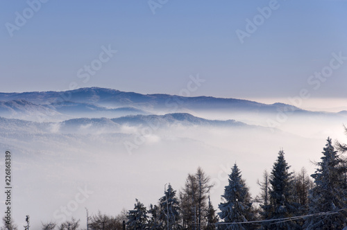 winter mountains up above the clouds