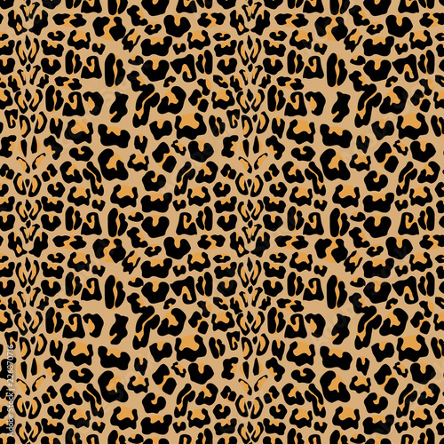 Vector seamless pattern with leopard fur texture. Repeating leopard fur background for textile design, wrapping paper, wallpaper or scrapbooking.