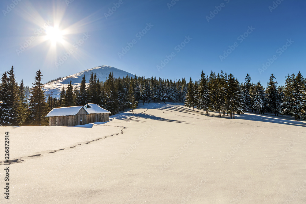 Beautiful winter landscape in the mountains with snow path in steppe and small little house. Happy New Year celebration concept. Beautiful winter landscape in the mountains with snow path in steppe and small little house. Happy New Year celebration concept.