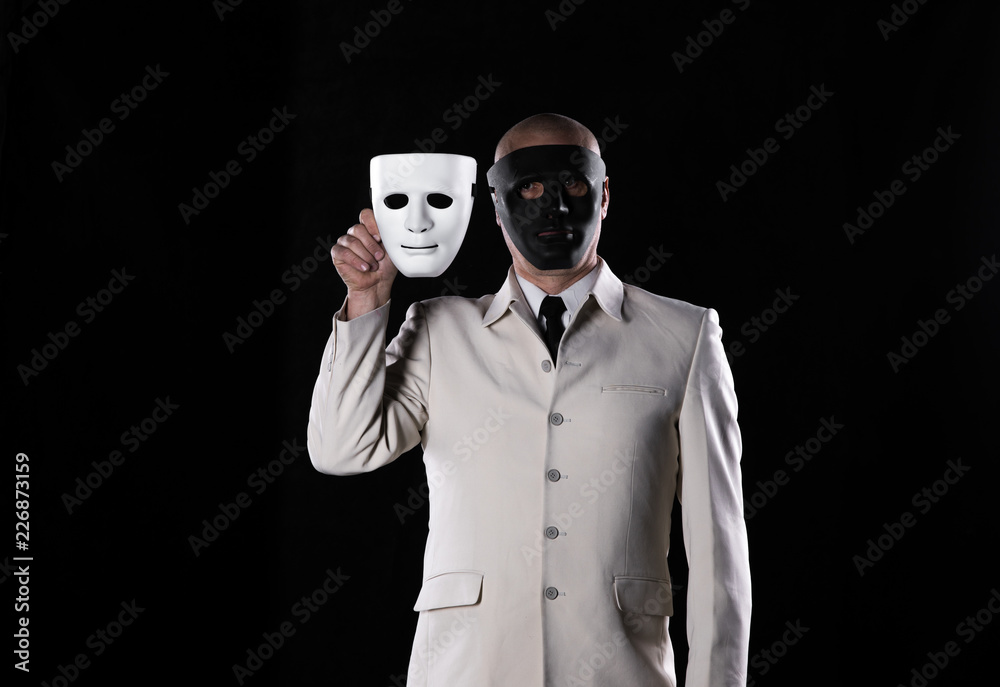 man in a strange white mask halloween Stock Photo | Adobe Stock