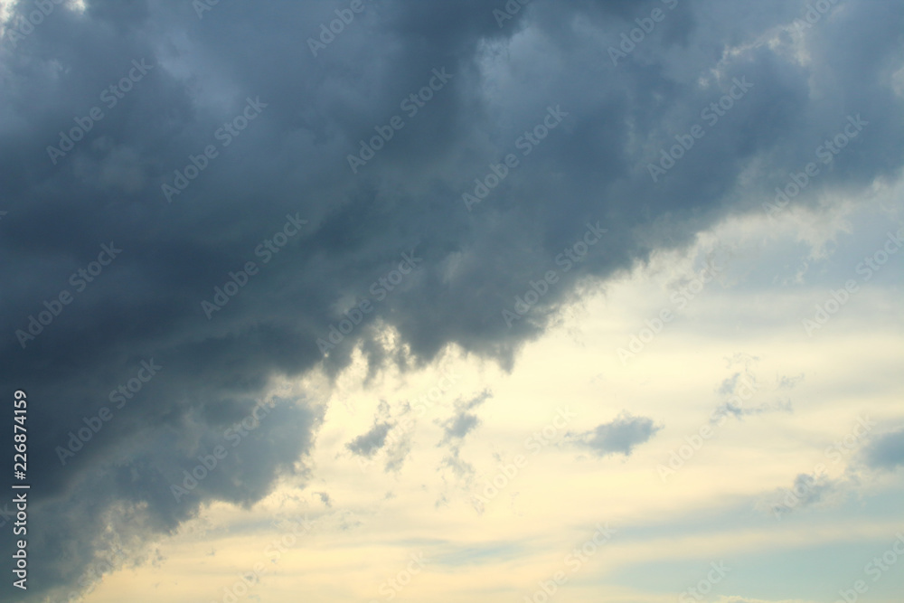 A large gray rain cloud. Background. Landscape.