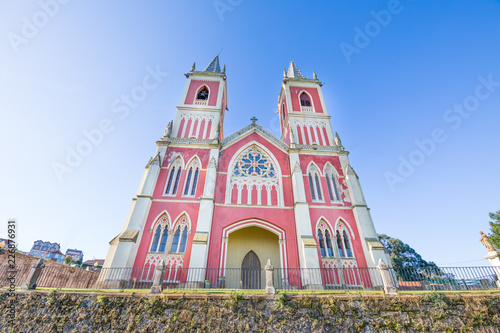 front of church of Saint Peter Ad vincula, neogothic monument from 1894 by architect Emilio Torriente, in Cobreces, Alfoz Lloredo, Cantabria, Spain, Europe photo