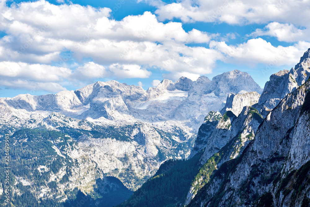 Beautiful mountains landscape with clouds in Austrian Alps. Salzkammergut region.