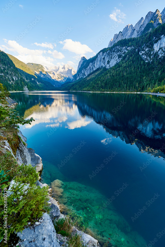 Colorful summer landscape with mountains, lake and trees in Austrian Alps. Salzkammergut, Gosausee