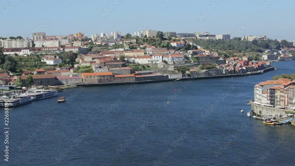 Top view of the Douro River and the Don Luis Bridge, in the city of Porto. Top view of the Douro River and the Don Luis Bridge, in the city of Porto.
