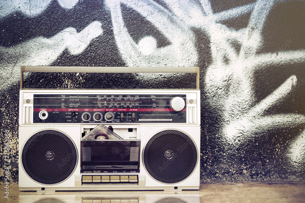 Retro boombox radio on a graffiti background Stock Photo | Adobe Stock