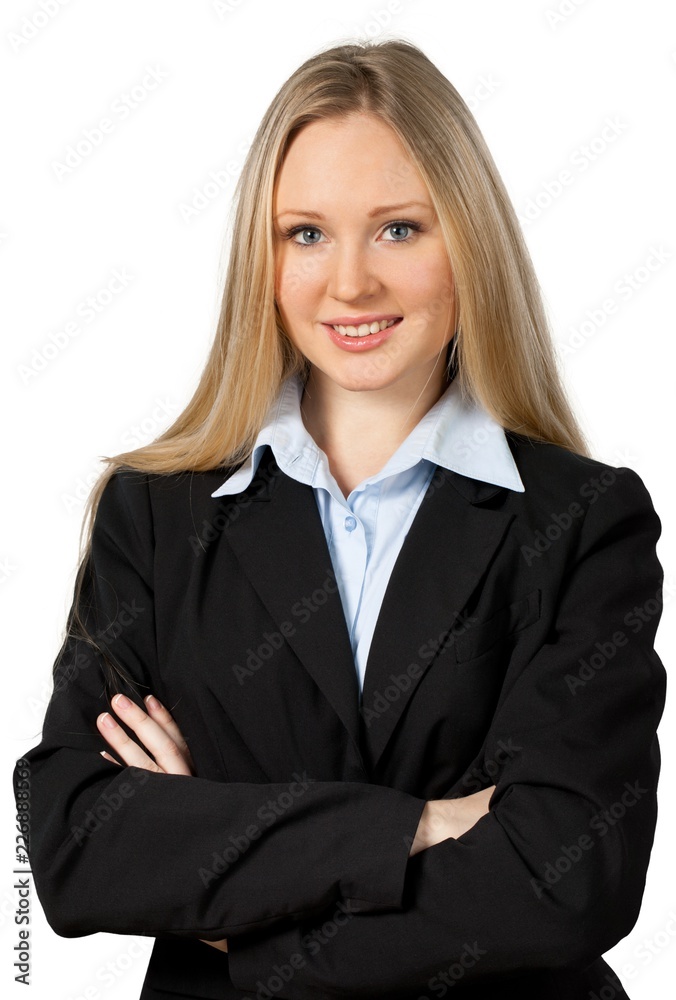 Friendly Young Businesswoman with Arms Folded - Isolated Friendly Young Businesswoman with Arms Folded - Isolated