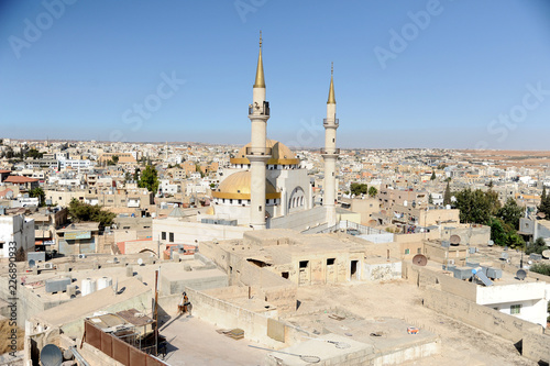 Madaba, Jordan, September 30th 2018: Panoramic photo of the southwestern part of Madaba with the mosque in the foreground