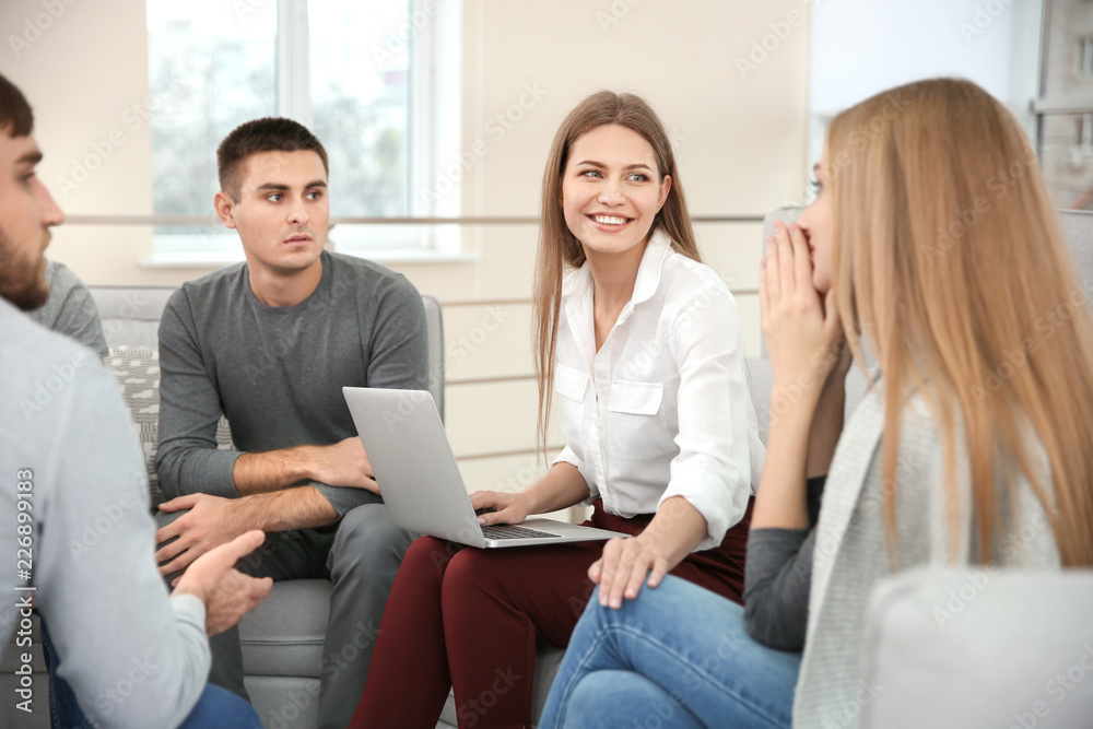 Therapist working with her group during session Therapist working with her group during session
